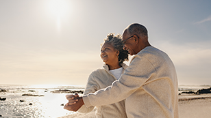 A senior couple at the beach